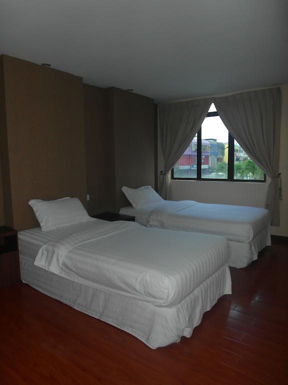 Mcity Inn Miri Zimmer foto