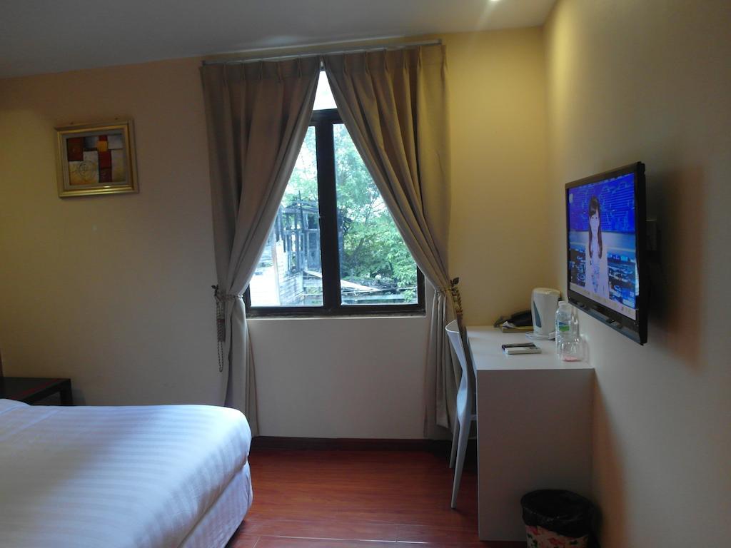 Mcity Inn Miri Zimmer foto